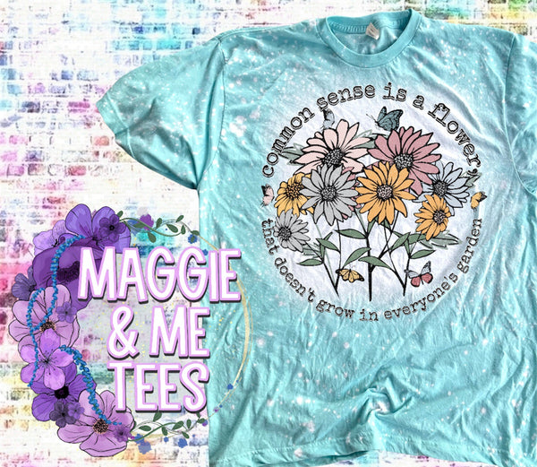 COMMON SENSE IS A FLOWER TEE